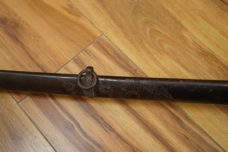 An 1845 pattern infantry officer’s sword by Henry Wilkinson, number 19387, regulation hilt, (fish skin covering missing), in its iron scabbard. Condition - fair to good.
